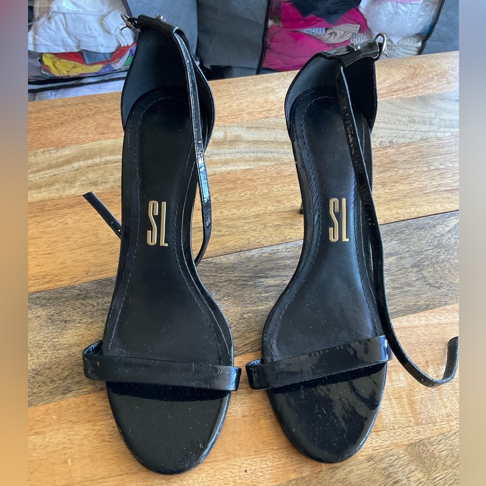 Worn Santa Lolla 
Made in Brazil size 9 1/2 USA 
Black strappy heels